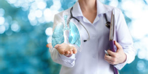 istockphoto Dr holding lung 645455526 300x151 - Doctor shows human lungs on blurred background.